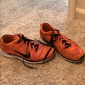 Pink/orange Nike Flynits